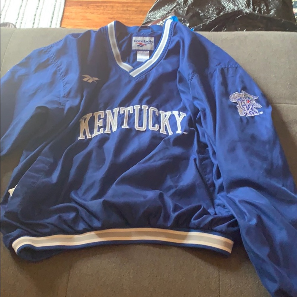 This is a old Reebok windbreaker. Size M